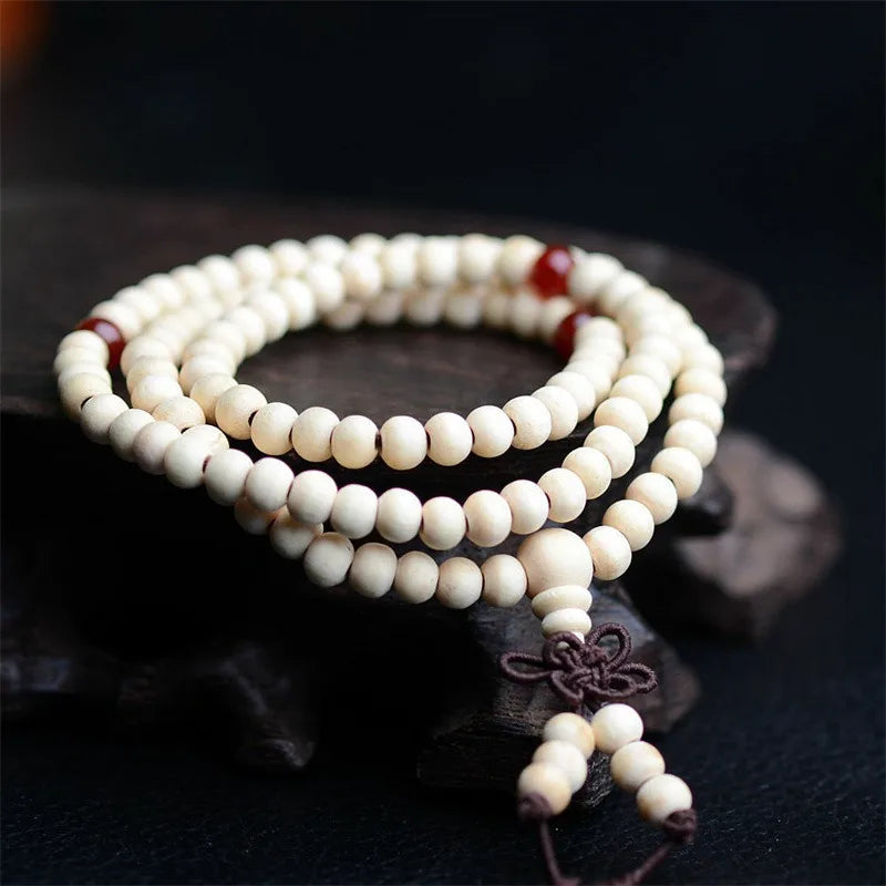 Bracelet santal naturel 108 perles – méditation et prière bouddhiste