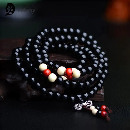 Mala 108 perles en santal naturel – bracelet de prière bouddhiste unisexe